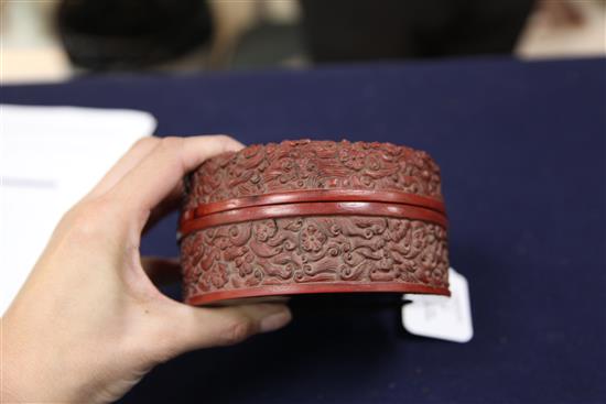 A boxed collection of six hardstone and a silver and enamel archers ring, 3.1cm diam., contained in a wood and faux lacquer box, 13cm